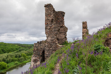 Ruins of medieval Hubkiv Castle on high steep riverbank, Ukraine