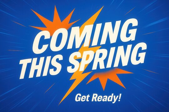 Bold text "Coming This Spring" on a dynamic blue background with orange starburst accents, conveying excitement and anticipation for an upcoming event or launch.