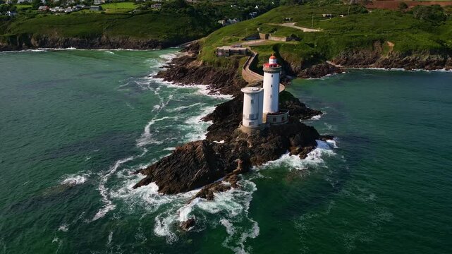 Panoramic panning drone movement near the coastal Petit Minou lighthouse twin towers, Plouzan&eacute;, Finist&egrave;re, Brittany, France.