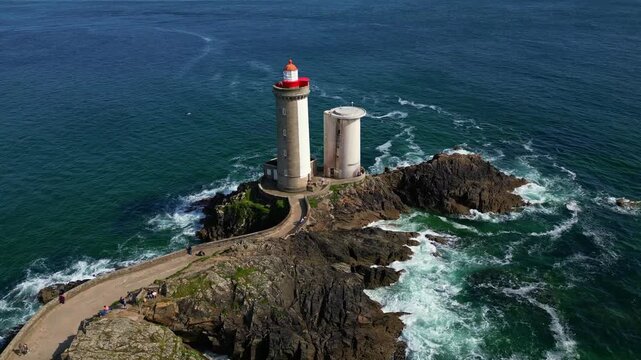 Beautiful panorama drone view of the red-roofed Petit Minou lighthouse by rocky sea peninsula, Plouzan&eacute;, Finist&egrave;re, Brittany, France.