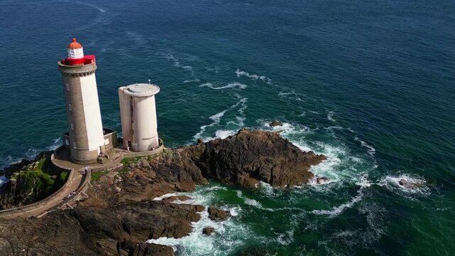 Panning drone movement near the Petit Minou lighthouse's two cylindrical towers, Plouzan&eacute;, Finist&egrave;re, Brittany, France.