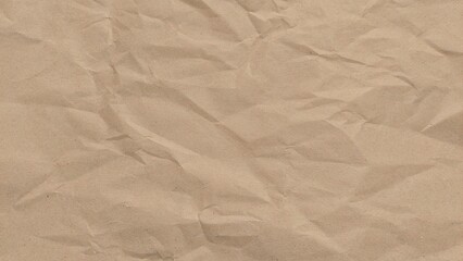 Crumpled kraft old brown paper texture background with copy space for design. Crumpled old brown vintage paper surface texture for background.