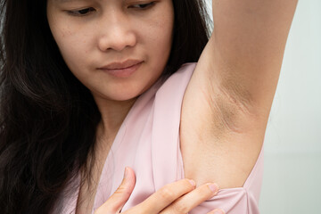 Asian woman have problem black armpit beauty skin care.