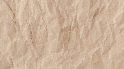 Crumpled kraft old brown paper texture background with copy space for design. Crumpled old brown vintage paper surface texture for background.