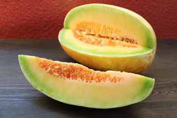 Juicy and fragrance Fresh Ripe Thai Melon on Wooden Table