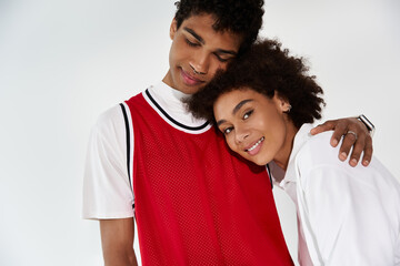 Young couple sharing a tender moment in a stylish and aesthetic setting showcasing their love
