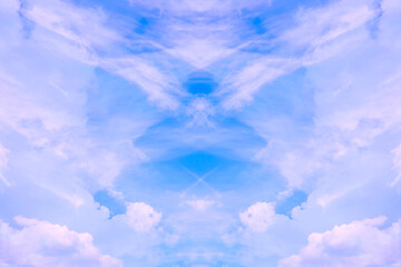 Symmetry.Blue sky with wavy clouds with symmetrical sides