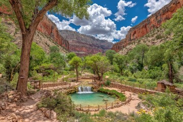 Canyon oasis with tranquil pool and waterfall. Lush greenery surrounds a serene, turquoise pool fed by a waterfall.  Red rock cliffs frame the vista. Sunny day with clouds