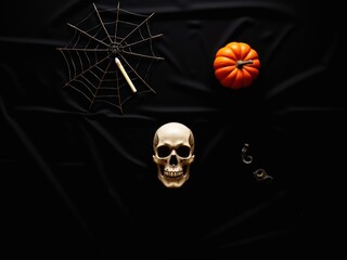 Minimal Halloween background with skull and pumpkin