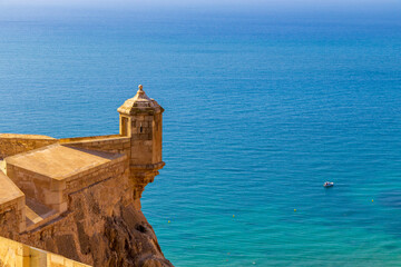 View of Castillo de Santa Barbara in Alicante overlooking the serene Mediterranean Sea, showcasing...