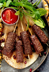 Barbecued kofta - kebab. Turkish and arabic cuisine.