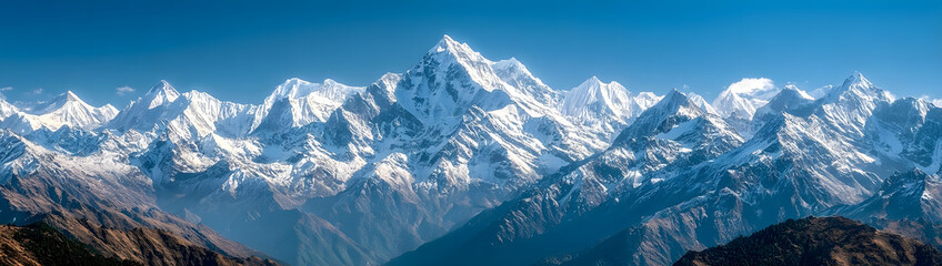 Obraz premium majestic himalayan mountain range with snow capped peaks and clear blue sky - scenic landscape graphy of the himalayas