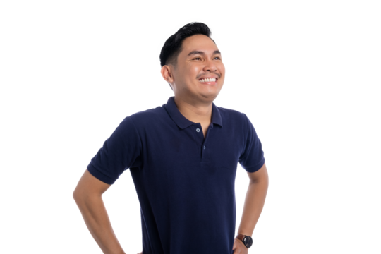 Smiling Asian man standing with hands on hips and looking up with hopeful and confident expression isolated on transparent background