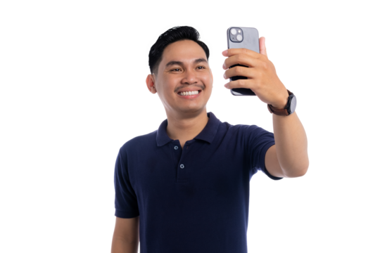 Happy Asian man taking selfie with smartphone while smiling and posing isolated on transparent background
