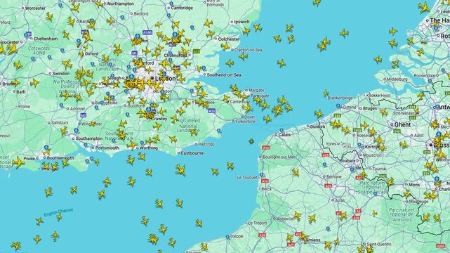 Real-Time Flight Traffic Over English Channel and Western Europe, Live map view of dense air traffic over southern UK, the English Channel, and northern France