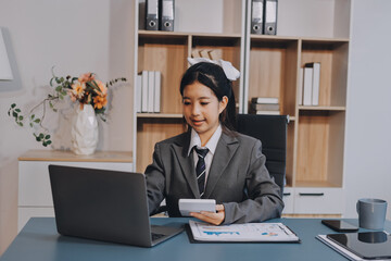 Young adult happy smiling Hispanic Asian student wearing headphones talking on online chat meeting...