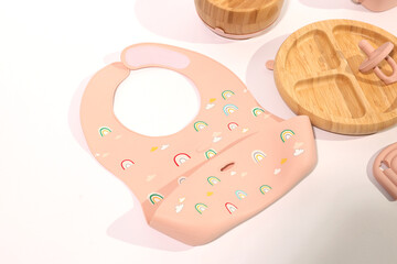 Pastel Pink Silicone Baby Bib with Rainbow Design;  Adorable Bamboo Baby Bowl and Plate Set.