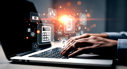 Hands typing on laptop with glowing financial and tax icons floating above keyboard technology