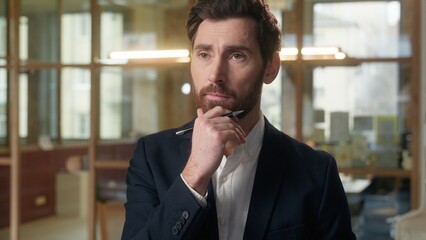 Businessman pensive guy business man thoughtful working in office documents consider sign contract deal upset think problem solution analyzing planning Caucasian male write bank insurance doubt sad