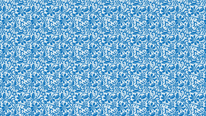 Intricate blue floral lace pattern on a white background creating a delicate textile design effect