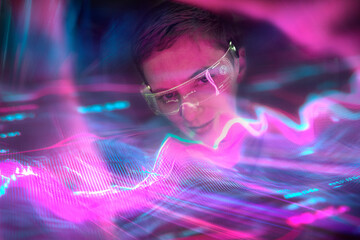 Woman engineer with AR glasses interacting with data stream