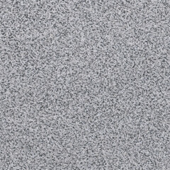 Fototapeta premium Abstract speckled texture with gray and black patterns, seamless background.
