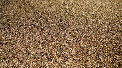 Tiny pebbles uniformly covering surface