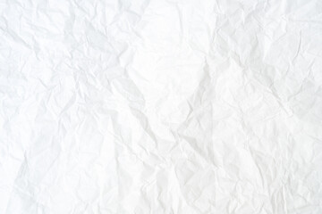 Top view and full frame of wrinkled or crumpled white paper texture used as crumpled white paper background texture in decorative art work
