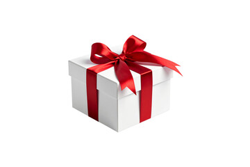 Elegant white gift box with red ribbon bow isolated on transparent background