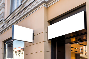 Two Mock Ups Of Restaurant Blank White Rectangular Street Signboards On Yellow Wall