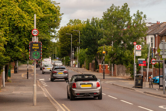Speed sign and happy face, speed limitation in UK. English traffic. Speed limit.