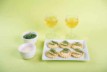 Salmon mousse tartlets in a plate