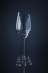 Wine glasses in a row, selective focus. Set of wine glasses. Shallow depth of  field. Toned image