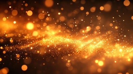Golden glitter particles swirling on dark background