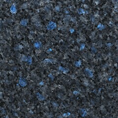 A close-up shot of a polished granite surface, showcasing a seamless blend of dark grey and speckled blue tones. The image presents a textured aesthetic.