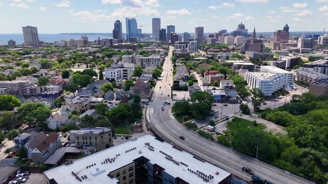Aerial view of the Milwaukee WI skyline featuring Van Buren Street starting from North Commerce Street