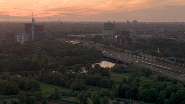 Sunset Aerial of Amsterdam Zuidoost, River Amstel and A10 Highway