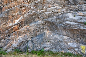 Rugged rock layer wall