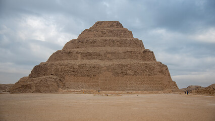 The Step Pyramid of Djoser at Saqqara, Egypt. An ancient architectural marvel from Egypt's Old Kingdom period.