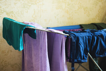 Washed clothes are dried on a dryer