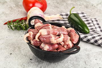 Fresh raw chicken hearts in the bowl