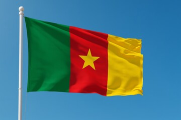 Naklejka premium Cameroon silk flag waving against clear blue sky during a bright day. Cameroonian flag - the national symbol of Cameroon, Cameroonian flag at sunrise