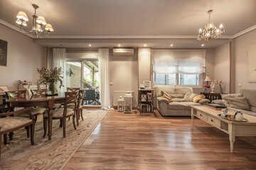  armchairs, coffee tables, and side tables. The choice of these elements should balance comfort with style