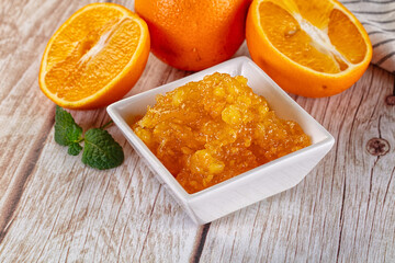 Sweet orange jam in the bowl