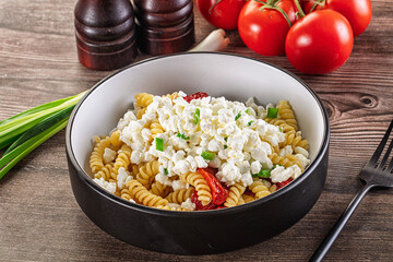 Italian pasta fusili with curd