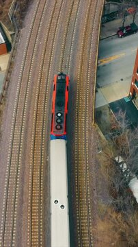 Chicago Illinoise 10.04.2022 Top view of a subway passenger train traveling in Chicago Illinois. The infrastructure of the city from a bird's eye view and the train and railway.