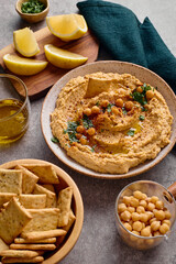 Delicious hummus with olive oil, chickpeas and parsley