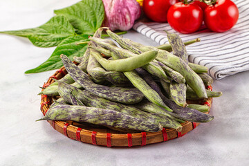 Raw green bean strips heap