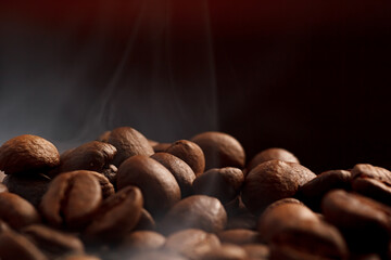 coffee beans on a dark background with a red highlight on the background, coffee beans close-up for a coffee shop