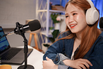 People in the podcast studio talking and recording